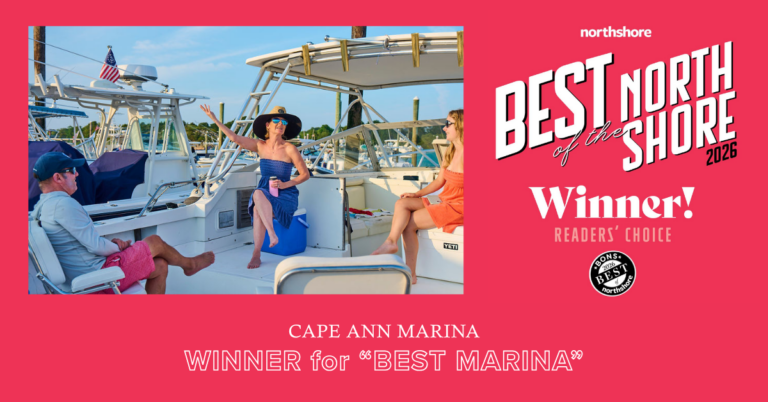 Women on boat with two other people at marina