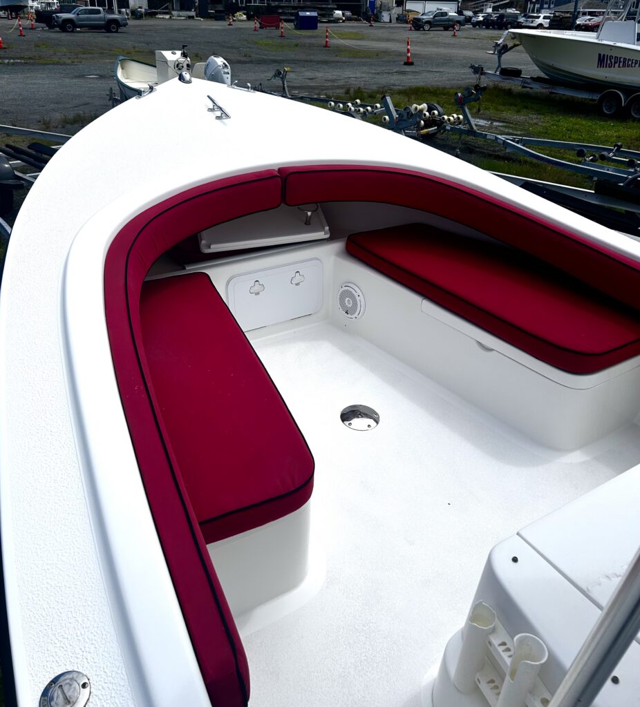 front of Eastern Boat with red cushions