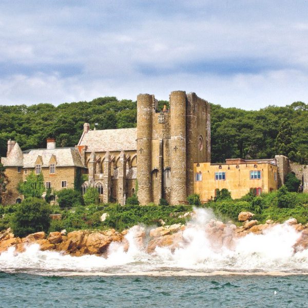 Hammond Castle on the water waves crashing