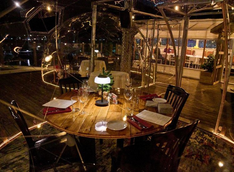 Low light table setting in clear dome