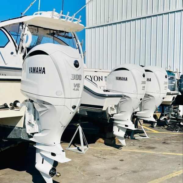 YAmaha Outboards on the back of boats out of the water