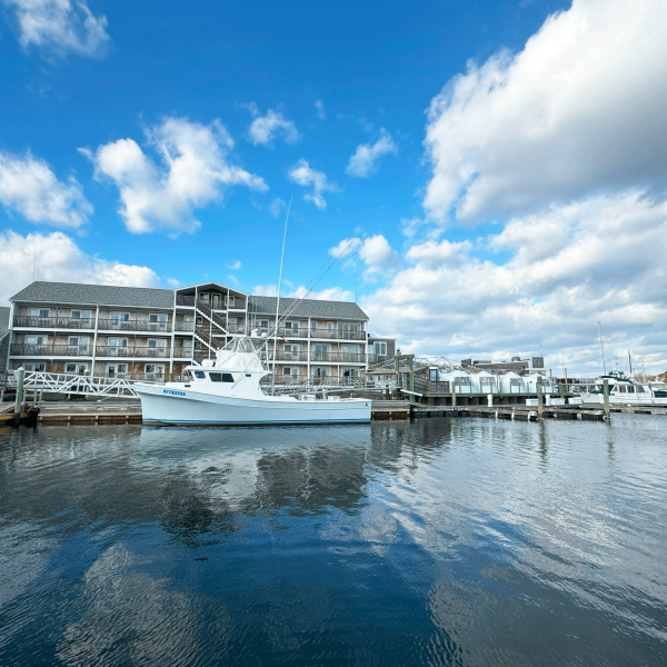 Hotel Igloos boat at a dock Cape Ann Marina