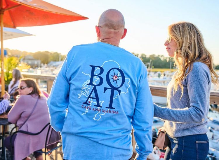 Guy with BOAT blue shirt on
