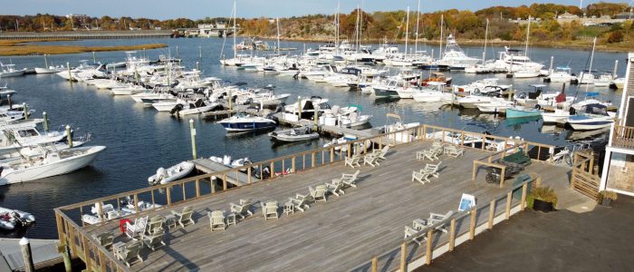 aerial of marina, deck and riverfront